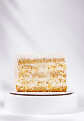 Delicious vanilla layer cake displayed elegantly on a simple stand