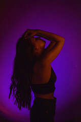 Moody Neon Portrait of Woman with Creative Lighting and Motion Blur