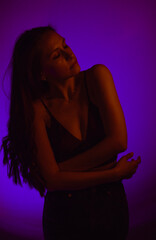 Moody Neon Portrait of Woman with Creative Lighting and Motion Blur
