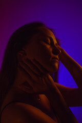Moody Neon Portrait of Woman with Creative Lighting and Motion Blur
