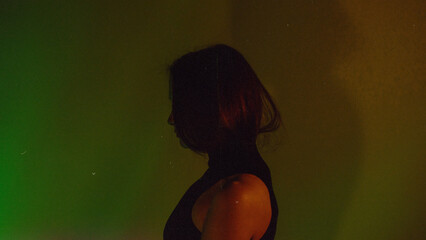 Moody Neon Portrait of Woman with Creative Lighting and Motion Blur