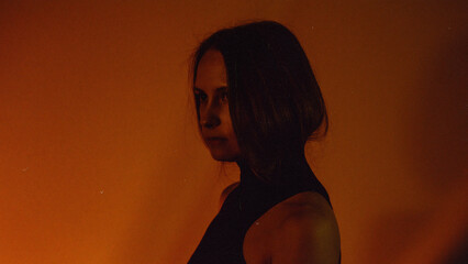 Moody Neon Portrait of Woman with Creative Lighting and Motion Blur