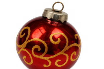 Christmas ornament concept for holiday season. Red bauble with golden glitter swirling patterns, isolated on transparent background