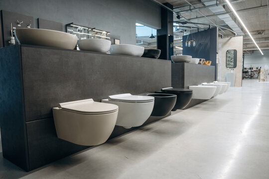 Modern Display of Designer Sinks and Toilets in a Bathroom Showroom