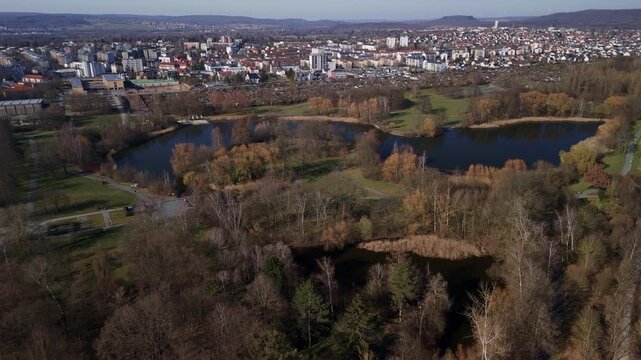 Aerial Cityscape with Lakes and Greenery