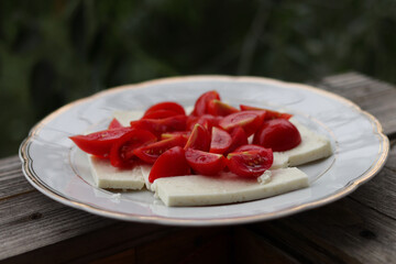 Traditional sheep cheese with tomatoes.