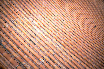 Close-up view of ancient details, Beijing, China's Summer Palace building roof. The pattern is intricate, the texture aged, revealing historic craft. The sun highlights the building.