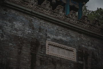 Close-up of an ancient building in Beijing, China's Summer Palace. The image captures intricate details of the structure, revealing its age and craftsmanship.