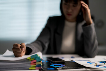 Stressed businesswoman suffering burnout from excessive workload