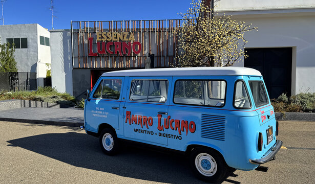 Vintage Amaro Lucano van parked in front of the Essenza Lucano distillery in Pisticci Scalo, Italy