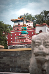 An ancient building in Beijing, China, part of the Summer Palace, showcased in close-up details. The structure stands out.