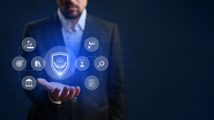 Technology and law merge as a man holds digital icons of security in a modern setting