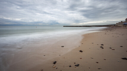 sandy beach on the embankment of Zelenogradsk