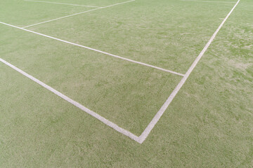 White lines on synthetic turf in an open sports field