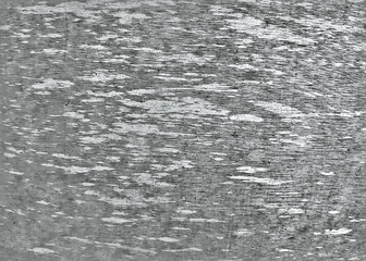 Texture of old gray wooden board with natural color discoloration patches