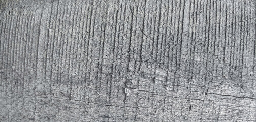 Rough texture of old weathered gray wooden board plank