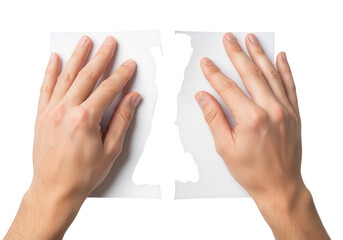 Hands tearing a sheet of white paper, showing the concept of separation