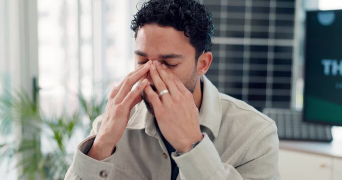 Tired, man or headache in office with tech for bad news, environmental compliance issue or fail. Exhausted, person or migraine with sustainability problem, greenwashing penalty or ESG reputation risk