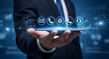 Businessman holding phone with digital contact icons for modern business communication