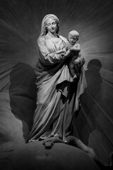 La Vierge à l'Enfant (The Virgin Mary with the Infant Jesus) by Jean-Baptiste Pigalle. Église Saint-Sulpice (The Church of Saint-Sulpice) in Paris.
