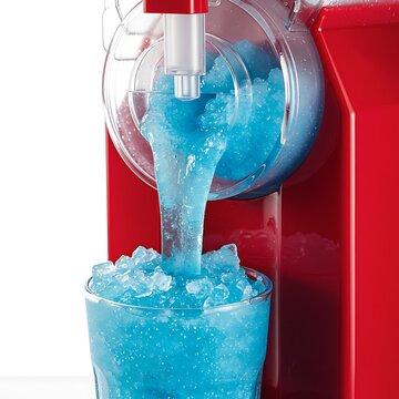 slushy ice pouring from machine, isolated on white background