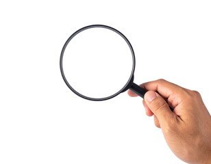 A hand holding a black magnifying glass with a clear lens, positioned in the foreground and isolated on a clean light gray background.