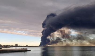 Large fire with black smoke and toxic emissions