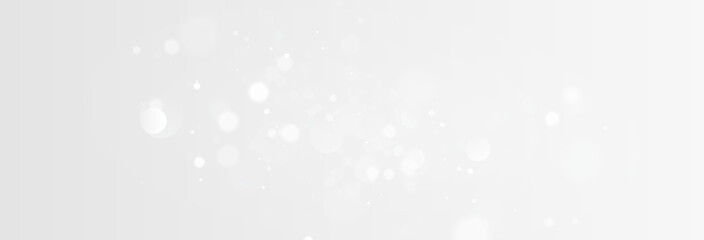 Christmas glowing bokeh confetti light and glitter texture overlay for your design. Festive sparkling white dust png. Holiday powder dust for cards, invitations, banners, advertising.