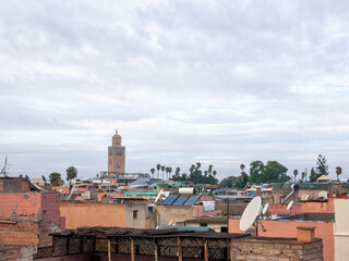 Rooftop Vista of Marrakech, Morocco, Showcasing the Iconic Koutoubia Minaret and Traditional Urban Architecture
