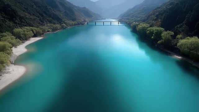 The highway meanders through mountains and rivers with rippling turquoise waves