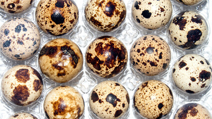 Quail eggs are a dietary food product.Quail eggs background.Quail eggs in a package.Quail eggs.
