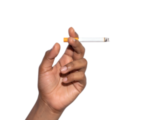 A hand holding a lit cigarette with a visible filter tip and ash, against a simple light gray background.