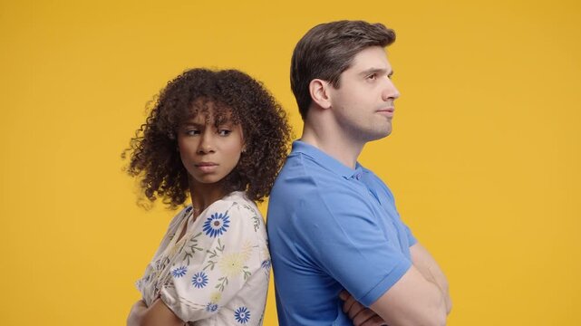 Interracial Offended Couple. Quarreling, Standing Back. Selfishness, Resentment