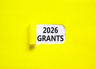 2026 Grants symbol. Concept words 2026 Grants on beautiful white paper. Beautiful yellow paper background. Business and 2026 grants concept. Copy space.