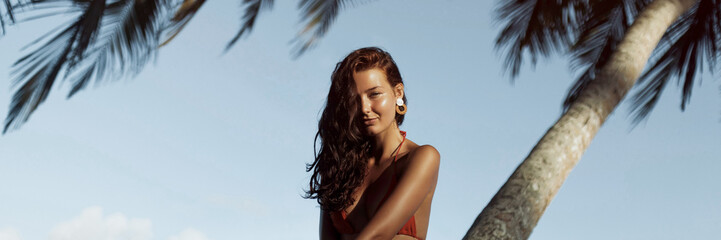 Woman in Red Bikini with Palm Trees