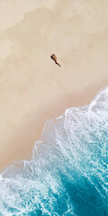 Aerial View of Relaxing Woman in Bikini on White Sand Beach