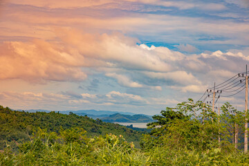 The landscape features vast green hills stretching into the distance can see the islands in the sea. Ranong, Thailand.