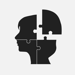 Female head from puzzle pieces, mental disorder