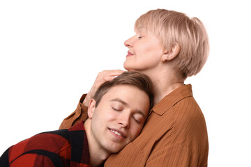 Mother hugging her son on white background