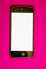 A smartphone featuring a clean white screen, placed vertically on a bright, saturated pink (fuchsia) background. This eye-catching and versatile mockup is ideal for showcasing interface designs, mobil