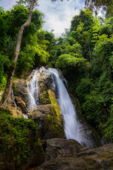 Obraz premium A gorgeous waterfall captured in long exposure, Punjaban Waterfall, national park, Ranong, Thailand.