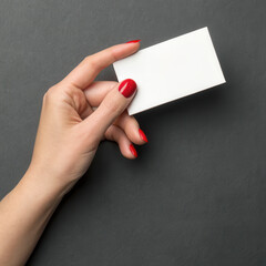 Professional hand holding blank card for business, marketing, corporate branding, presentation, advertising, and professional identity in modern office setting