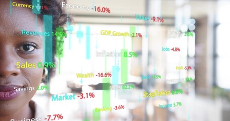 Studying businesswoman reviewing colorful financial overlay in open-plan office, copy space