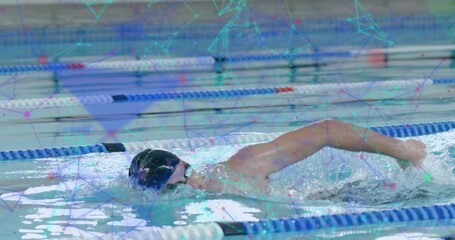 Swimming athlete performing front crawl in marked pool lane, with black swim cap and colored ropes