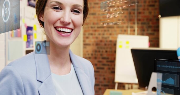 Smiling female developer presenting code overlays in office on whiteboard and monitor, copy space