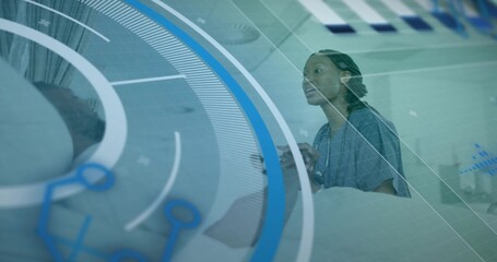 Scrub-clad nurse checking patient vital signs in ward, with tablet, digital projection, copy space