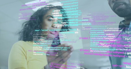 Tech developers examining transparent code overlay in office with smartphone and laptop