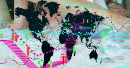 Hands holding pen and analyzing financial documents at office desk, with map overlay and charts