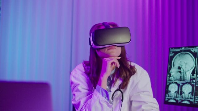 Medical Specialist Analyzing Brain Scans With AI and Big Data Tools. Concept of Smart Healthcare, Predictive Diagnostics, and Advanced Medical Technology for Neurological Research.