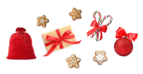 Christmas candy canes, cookies, gift box and festive decor isolated on white, set